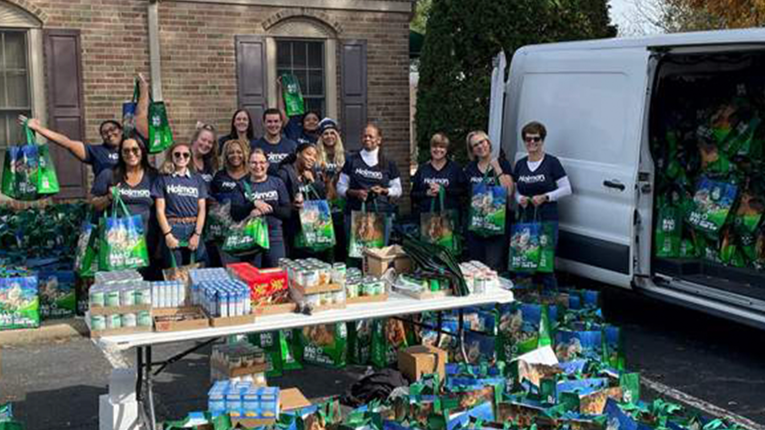 holman employees working a food drive